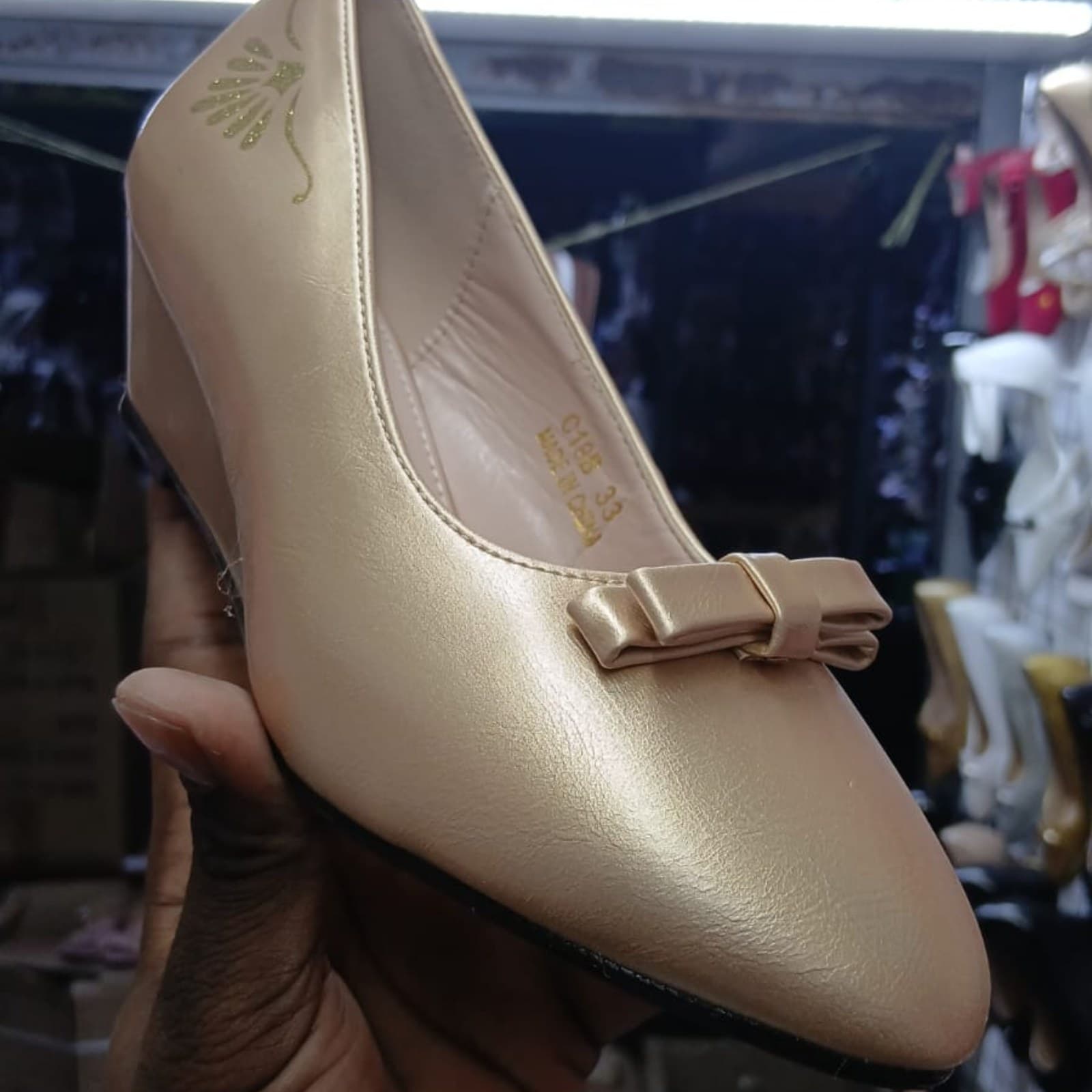 Sophisticated Champagne Gold Wedge Pumps